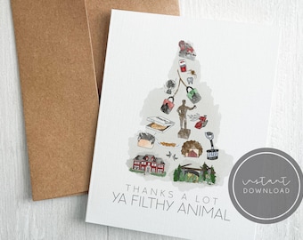 May include: A white card with a watercolor illustration of a Christmas tree made of items from the movie Home Alone. The tree is decorated with a paint can, a shovel, a spider, a toothbrush, a fan, a pizza box, a brick, a bird, a house, and a figure of a man. The text "Thanks a lot ya filthy animal" is printed below the tree.