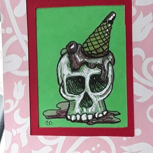 Original mini skull drawing. Quirky. Fun. Titled &quot;Raspberry Ripple&quot;. Mock framed.