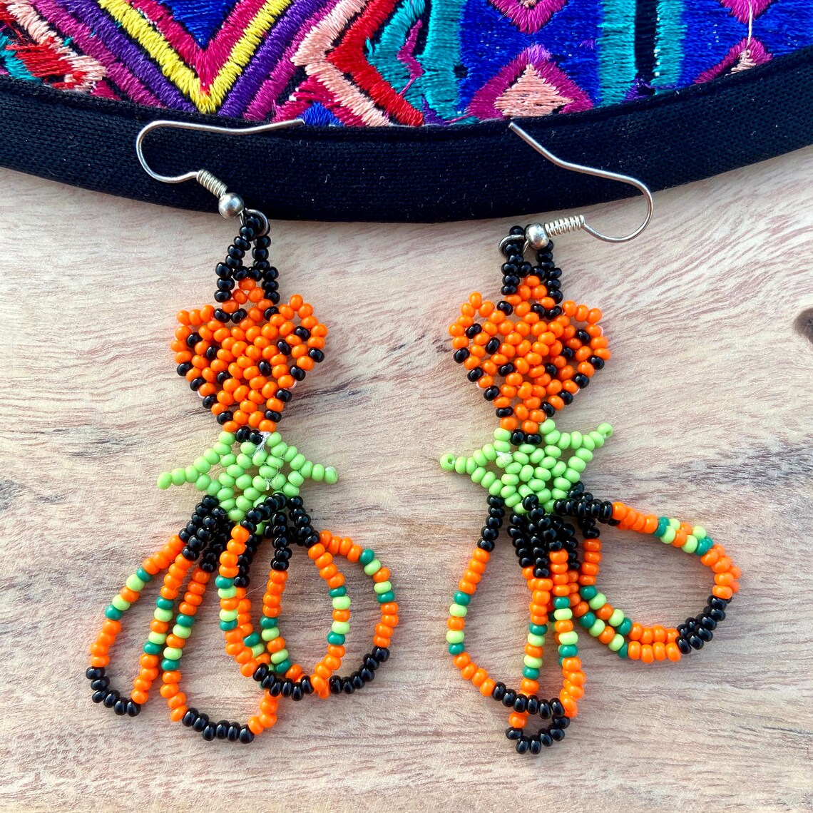 Mexican beaded earrings made by Huichol artisans Etsy