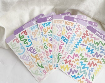 Puede incluir: Un conjunto de diez hojas de pegatinas de colores con varias formas y diseños abstractos. Las hojas están etiquetadas con números y el texto "Lots Liv. Stef".