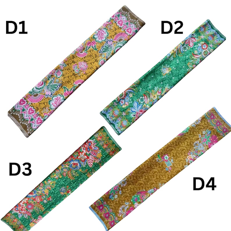 May include: Four rectangular fabric strips labeled D1, D2, D3, and D4. D1 and D4 feature a mustard yellow background with pink, blue, and white floral patterns. D2 and D3 feature a green background with similar vibrant floral and fan motifs.