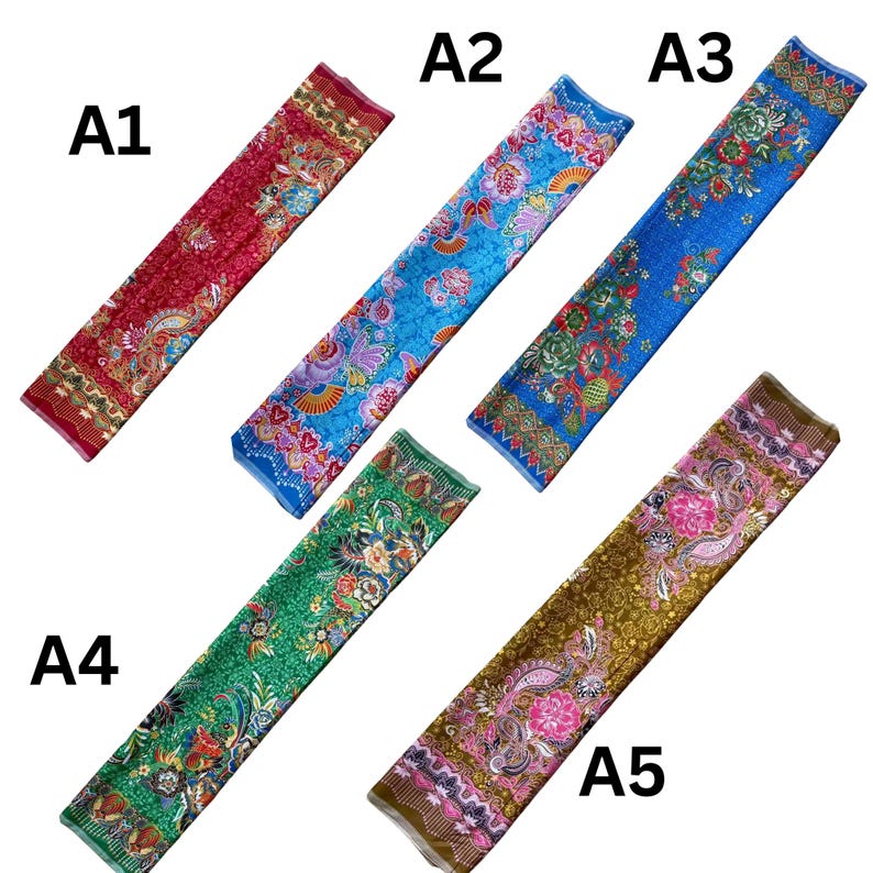 May include: Five rectangular fabric strips labeled A1 through A5, each featuring distinct floral and paisley patterns in red, light blue, dark blue, green, and brown. Each strip displays intricate, colorful botanical motifs and decorative borders.