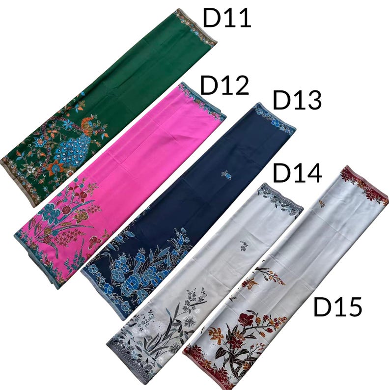 May include: Five rectangular fabric panels labeled D11 through D15. D11 is dark green with a peacock print. D12 is bright pink with floral patterns. D13 is navy blue with blue floral motifs. D14 and D15 are white with black and red floral designs.