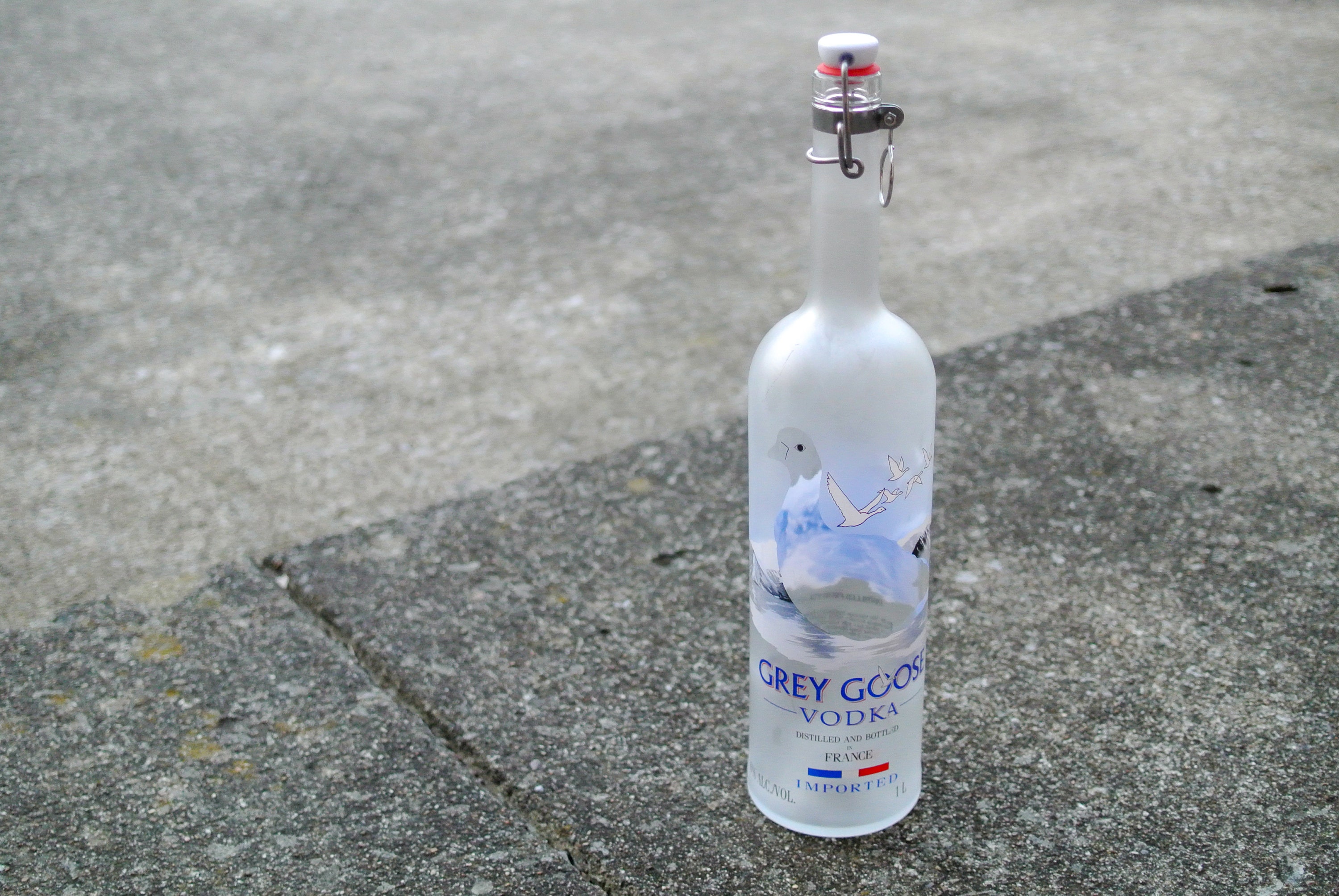 Converted Glass Water Bottle with Custom-Fit Pop-Up Cap | Repurposed Grey  Goose® Vodka Bottle