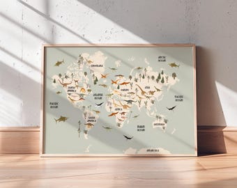 May include: A rectangular wall print featuring a world map on a sage green background. The continents are illustrated in a light cream color, populated with various dinosaur figures, trees, and labels for oceans and continents in dark brown text.