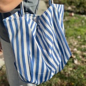 1 pièce de sac cosmétique en canevas à rayures verticales noir et blanc