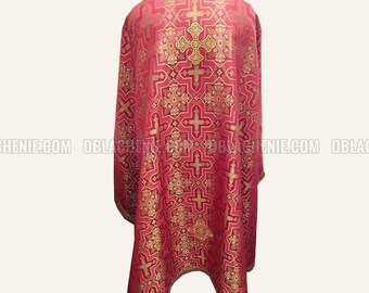 May include: A red liturgical vestment with a gold cross pattern. The vestment is made of a brocade fabric and has a traditional design.