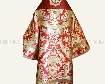 May include: A red and gold liturgical vestment with a floral pattern. The vestment has a high collar and a decorative design on the back.