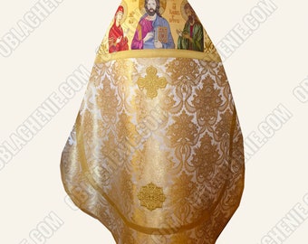 May include: White and gold liturgical vestment with a floral pattern and embroidered cross. The vestment features a panel with an image of Jesus Christ and two saints.