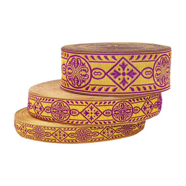 May include: Three rolls of gold and purple patterned trim. The trim has a geometric design with a repeating pattern of flowers and diamonds.