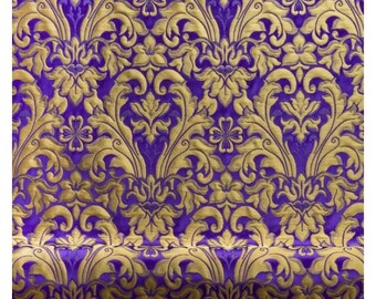 May include: Purple fabric with a gold damask pattern. The fabric has a raised texture and a luxurious look.