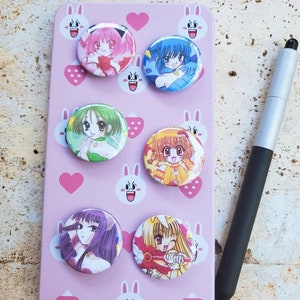 TMM anime manga inspired pinback buttons