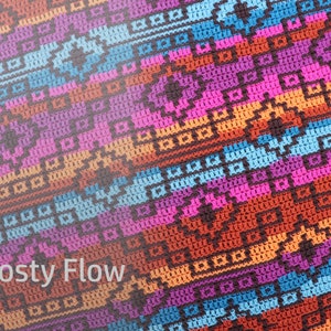 May include: A colorful crocheted fabric with a geometric pattern in shades of pink, orange, blue, and brown. The fabric has a textured surface and a diagonal pattern. The text "Frosty Flow" is visible in the lower left corner of the image.