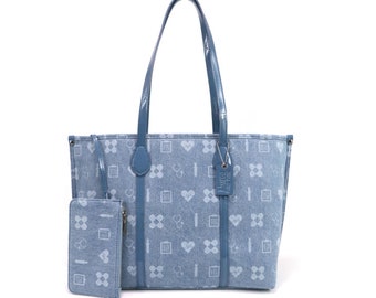 May include: A light blue tote bag with a white pattern of medical symbols, including hearts, stethoscopes, bandages, and pills. The bag has a matching light blue zippered pouch.