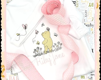 Beautiful, personalized newborn white gown with matching beanie stitched with classic Winnie the Pooh!  Two designs to choose from!