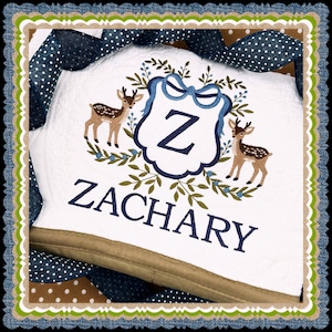 For the little deer hunter!  Personalized heirloom quilt with beautiful, embroidered crest - perfect baby gift!