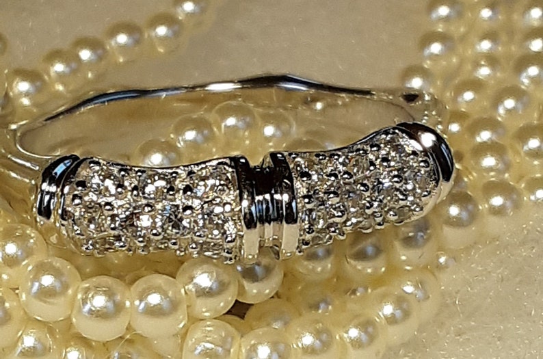 gorgeous signed Joseph Esposito sterling silver ring band....shimmering Czs as well!~marked espo 925 in inside of ring!~
