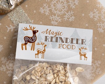 May include: A clear plastic bag filled with rolled oats, labeled "Magic Reindeer Food" with a brown reindeer illustration. The bag is sitting on a brown paper gift wrap with a white snowflake pattern.
