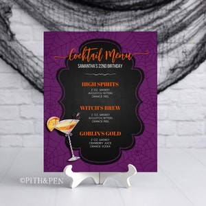 May include: A Halloween-themed cocktail menu on a white stand. The purple background features a spiderweb design. The menu includes the text "Cocktail Menu" and drink names like "High Spirits" and "Witch's Brew". The menu is for Samantha's 22nd birthday.