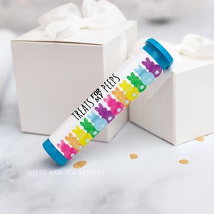 May include: A blue and white tube with a label that says "Treats for my peeps" and features a rainbow of watercolor bunny illustrations.