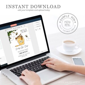 May include: A laptop computer displaying a honeybee-themed birthday invitation template on the screen. The invitation features a jar of honey, bees, and the text "Emily's Bee-Day!" The laptop is on a wooden table with a cup of coffee and a smartphone.