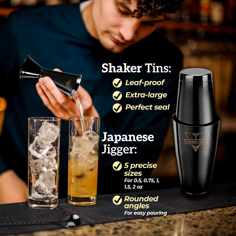 May include: A black cocktail shaker with a gold logo that says "Prodigy Mix". The shaker is next to a black and silver Japanese jigger with five measurements: 0.5, 0.75, 1, 1.5, and 2 ounces. The jigger has rounded angles for easy pouring.