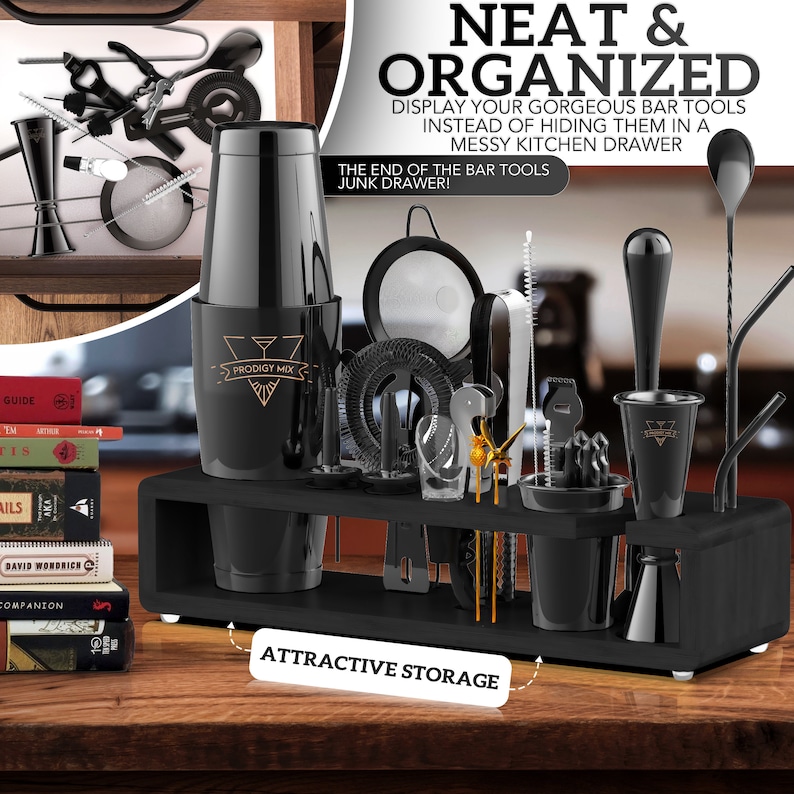 May include: Black bar tool organizer with a variety of tools, including a shaker, jigger, muddler, strainer, and stirrers. The organizer has a black wooden base and a black metal frame. The text "Prodigy Mix" is printed on the shaker.