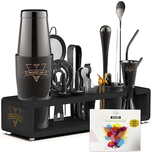 May include: Black cocktail shaker set with a wooden stand and a recipe book. The set includes a cocktail shaker, jigger, muddler, strainer, bar spoon, and other tools. The recipe book has colorful illustrations and the text "3D Classic Illustrated Cocktail Recipes".