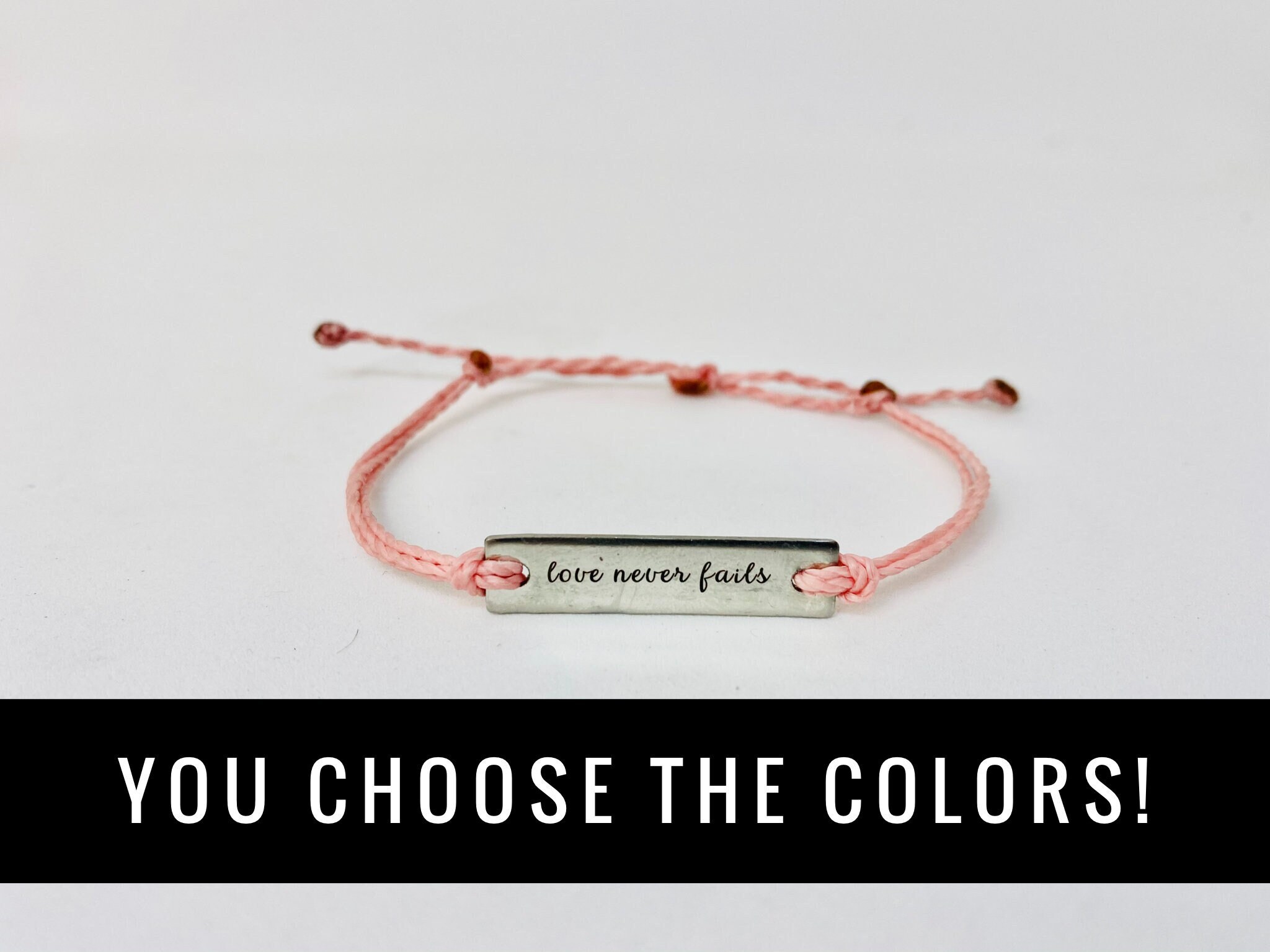 Love never fails bracelet best sale