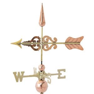 May include: A copper and brass weathervane with a pointed copper finial, a copper arrow, and a brass compass rose with the letters N, S, E, and W.