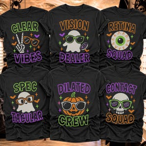 May include: Six black t-shirts featuring Halloween-themed graphics and text. Designs include a skeleton hand, ghosts, a pumpkin, and a skull, all wearing glasses. Text reads: Clear Vibes, Vision Dealer, Retina Squad, Spec Tacular, Dilated Crew, Contact Squad.