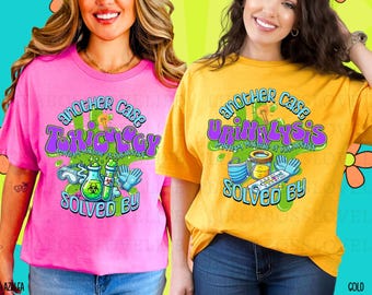 May include: Two t-shirts with a science theme. The pink shirt says "Another Case Toxicology Solved By" with a beaker, test tube, and gloves. The yellow shirt says "Another Case Urinalysis Solved By" with a beaker, test tube, gloves, and a urine sample.