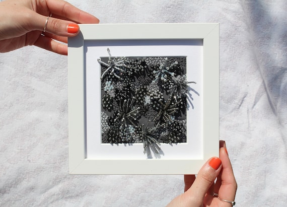 Framed medium dark grey embroidered coral artwork
