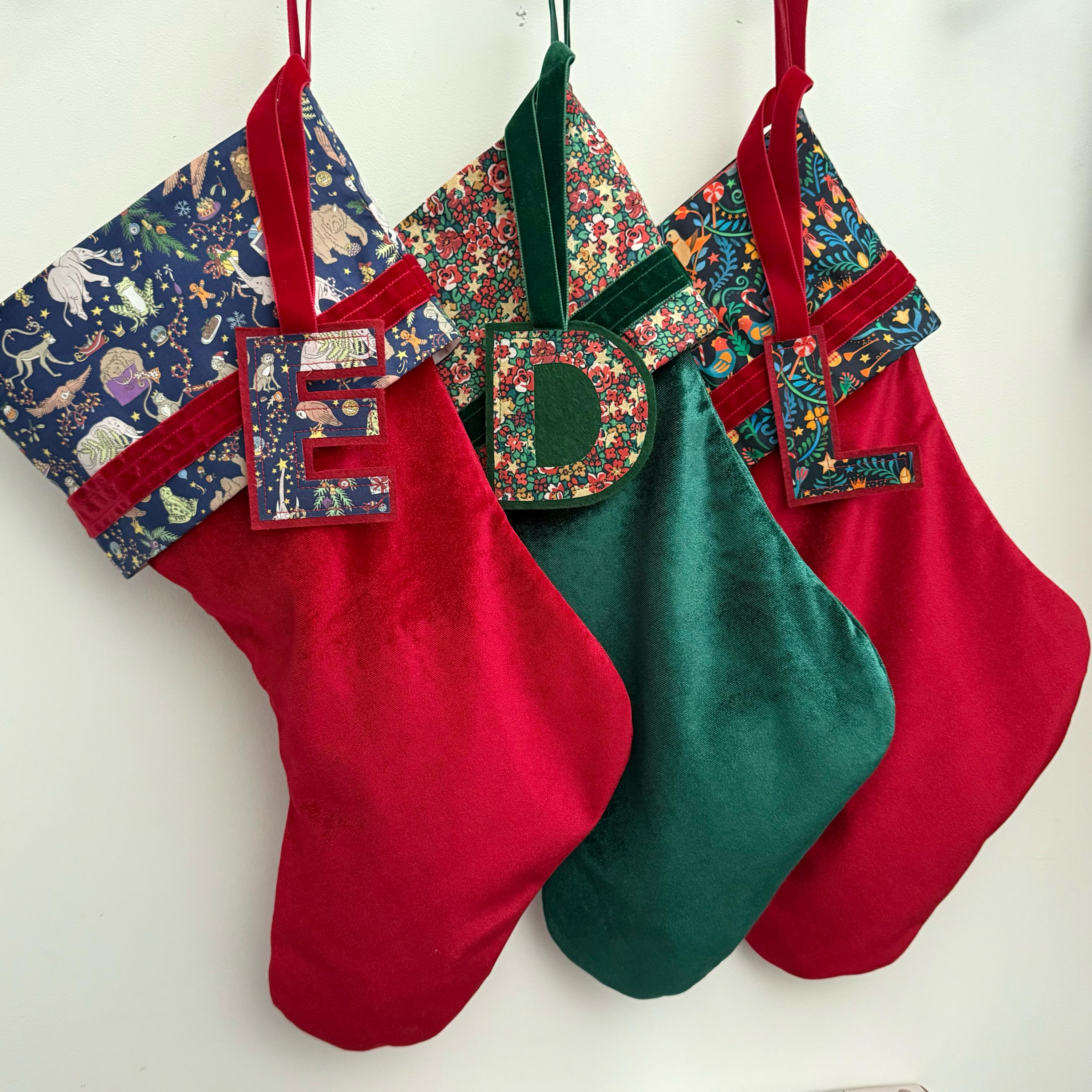 Liberty and velvet Christmas stocking with optional personalisation.