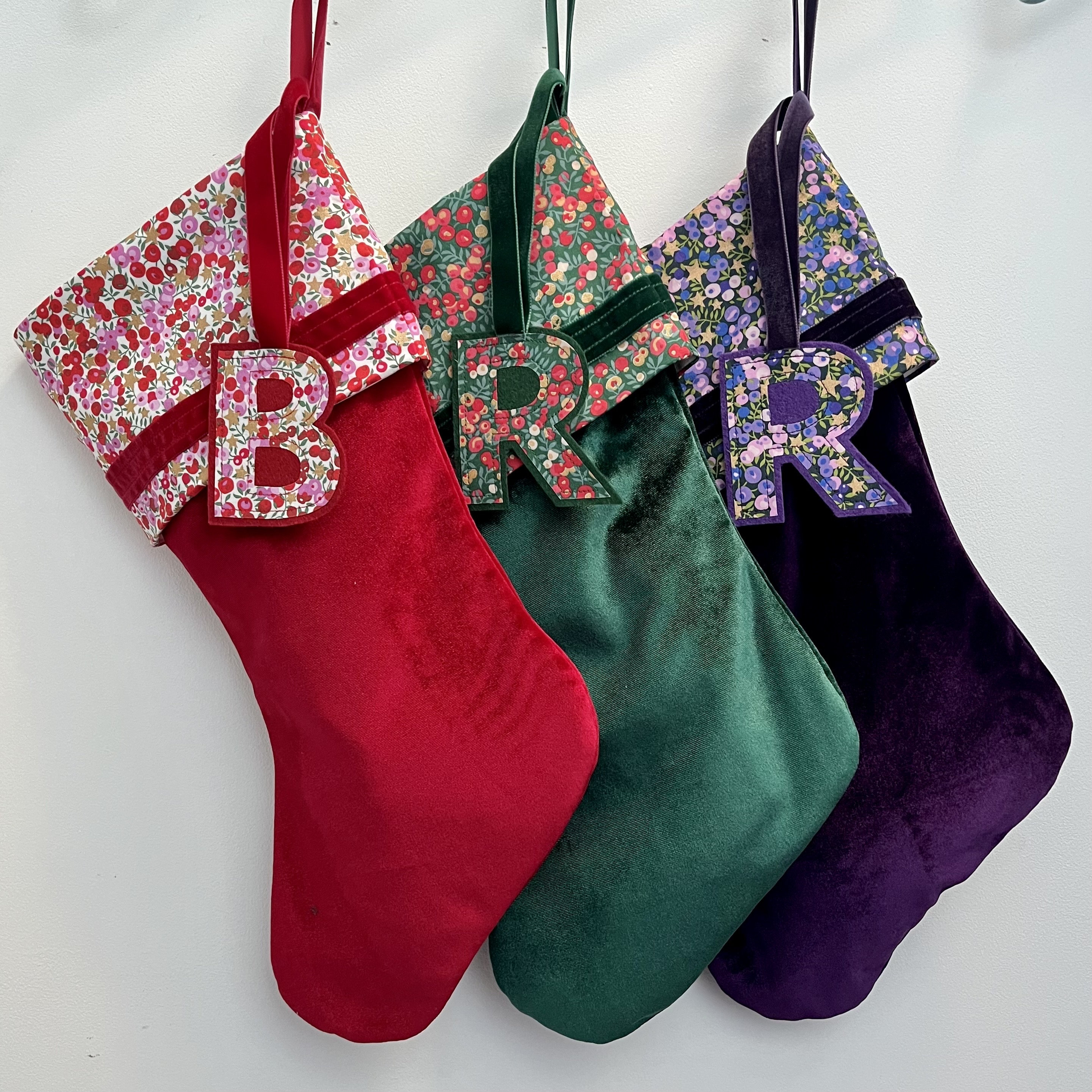 Liberty and velvet Christmas stocking with optional personalisation.