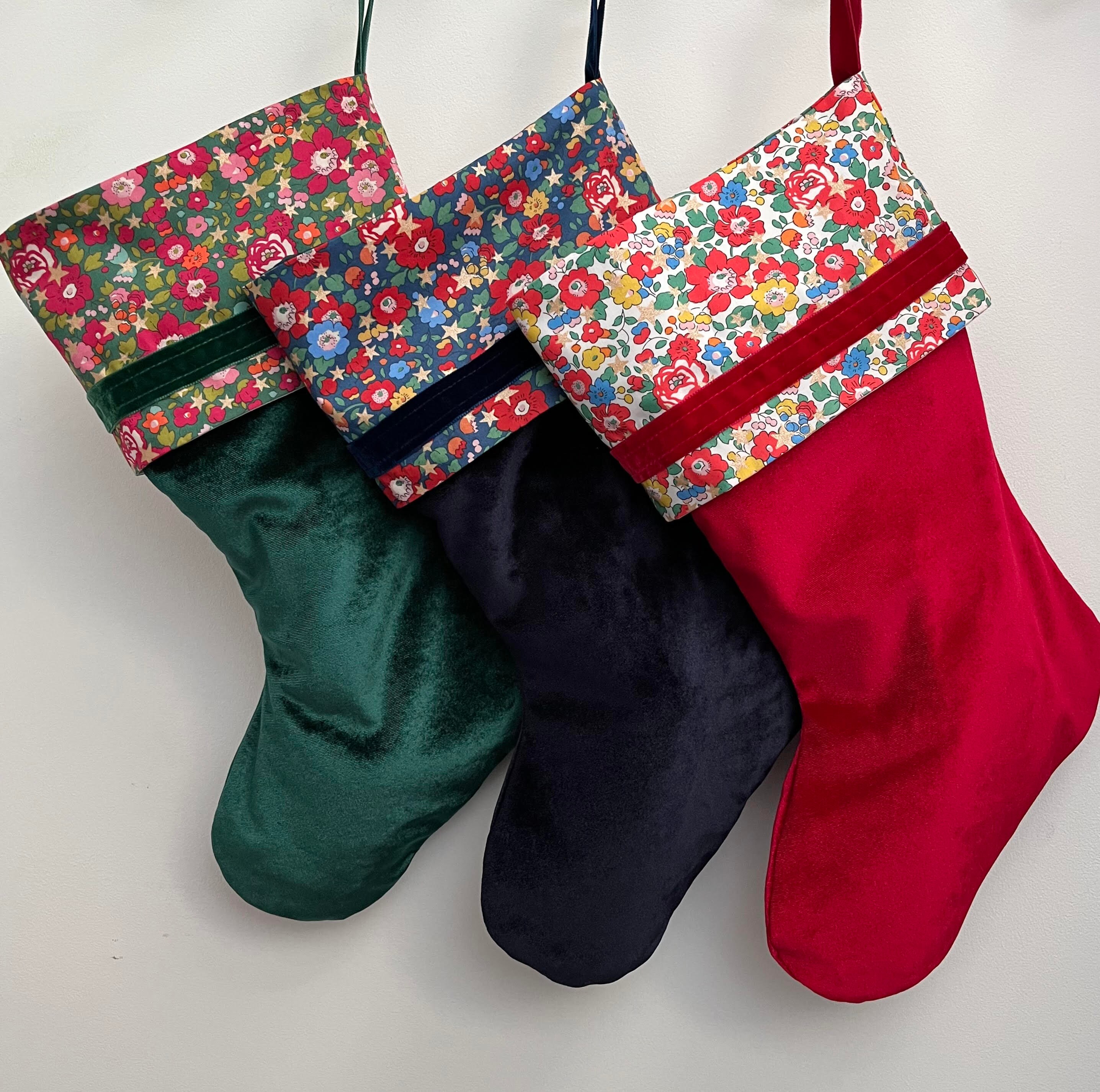 Liberty and velvet Christmas stocking with optional personalisation.