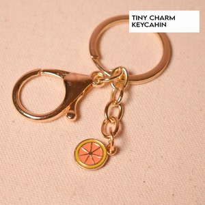 Chiusura portachiavi in oro con fetta d&#39;arancia, anello portachiavi Circtus, piccoli ciondoli in smalto arancione per la fornitura di portachiavi