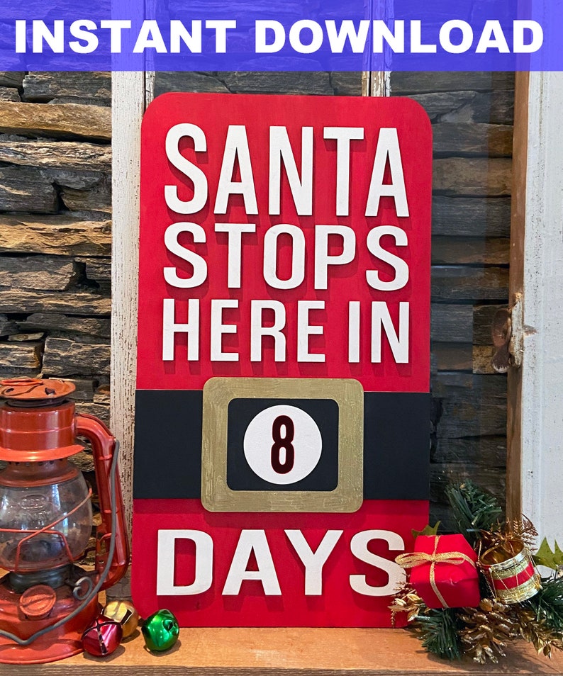 May include: Red wooden sign with white text that reads "Santa Stops Here In 8 Days". The sign has a black belt with a gold buckle and a gold circle with the number 8 inside.