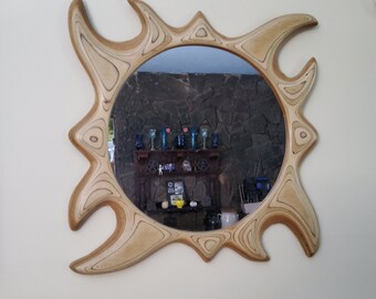 vintage handcrafted plywood sculptured sun mirror.