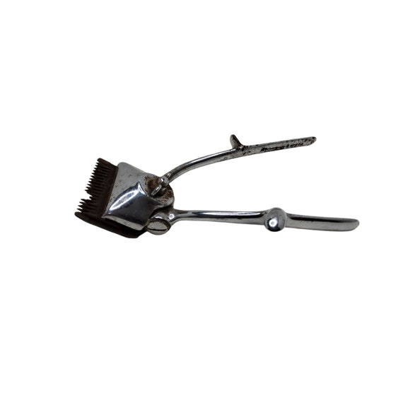 Palm held online hair clippers