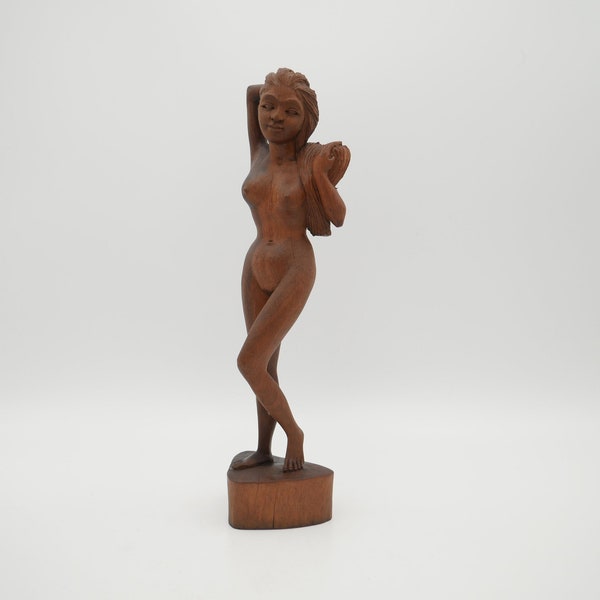 Hand carved nude wood sculpture