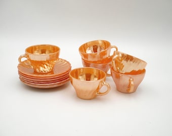 Teacup and saucer Fire-King peach luster swirl