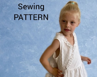 May include: A white sleeveless dress with a ruffled neckline and a gathered skirt. The dress is made of a lightweight fabric with a subtle texture. The text "PDS Sewing Pattern" is visible in the image.