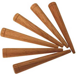 May include: Five wooden dowels, tapered at one end, arranged in a fan shape. The dowels are a light brown color and have a smooth, polished finish.