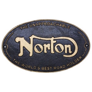 May include: Black oval metal sign with gold lettering that reads "The Unapproachable Norton The World's Best Road Holder".