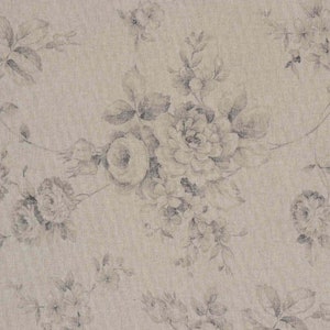 May include: A beige fabric with a floral design. The pattern shows clusters of roses and other flowers in grey and white, giving a vintage, watercolour effect. The fabric has a textured appearance.