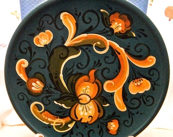 This decorative and functional plate is large enough to double as a small serving platter!