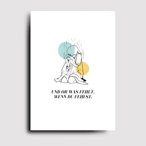 Könnte beinhalten: Ein minimalistischer Kunstdruck mit einer Strichzeichnung einer sitzenden Person, den Kopf gesenkt, mit Regen und zwei farbigen Kreisen. Der Text lautet: "UND OB WAS FEHLT, WENN DU FEHLST."