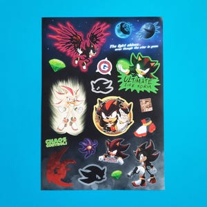 May include: A sticker sheet featuring characters from the Sonic the Hedgehog series. The stickers depict Shadow the Hedgehog in various poses, with text including "CHAOS CONTROL" and "ULTIMATE LIFE FORM". The background is dark with celestial elements.