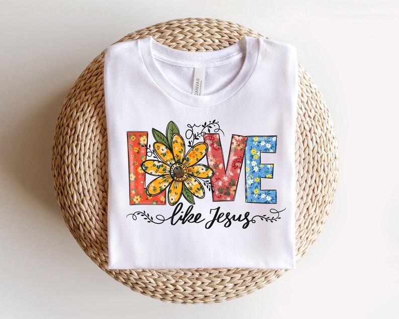May include: White t-shirt with a floral design that spells out "LOVE like Jesus".